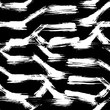 © Anna Babii - Grunge seamless pattern. Abstract dry brush strokes background. Black and white hand drawn texture. Vector illustration.