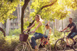 © Lucky Fenix - Happy family is riding bikes outdoors and smiling- Boy on bike with mother and father.
