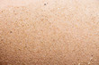 the texture of the sand on the skin
