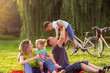© Lucky Fenix - Happy family time- Young family with children having fun in nature.