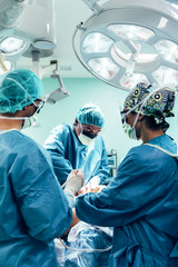 Team of Surgeons Operating