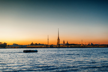 Wall Mural - Beautiful city night landscape, white nights in St. Petersburg, view of the Neva and Peter and Paul Fortress