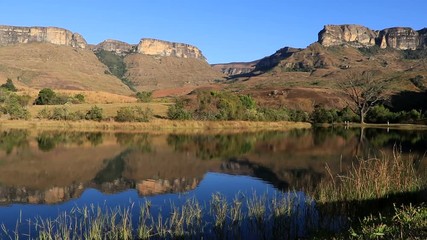 Canvas Print - Drakensberg mountains with symmetrical reflection in water, Royal Natal National Park, South Africa