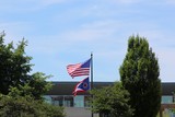 Fototapeta Londyn - The US and the Ohio State Flag blown by the wind.