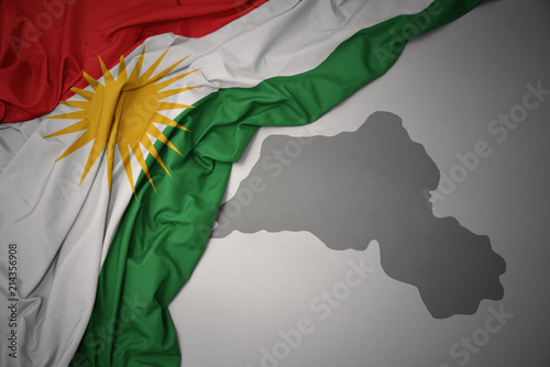 waving colorful national flag and map of kurdistan. Canvas-taulu