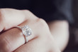 © Kwangmoozaa - engagement diamond ring on woman finger closeup