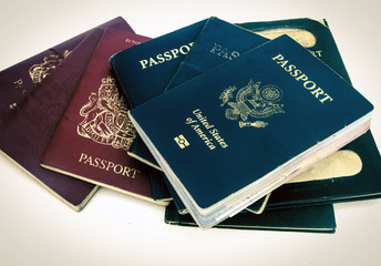 a colection of old used passports