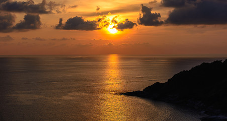 Wall Mural - Sunset light with cloudy sky at Promthep cape Puket Thailand.