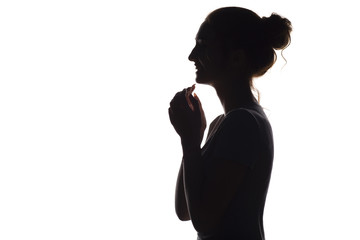 Wall Mural - silhouette of sincere laughing girl on a white isolated background