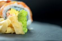 Ginger And Wasabi For Japanese Sushi On Black Slate Dish