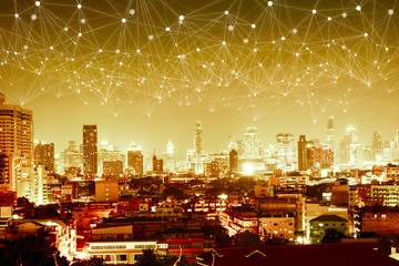Poster - abstract network web line connection over night modern city background , gold tone