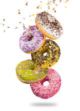 Tasty Doughnuts In Motion Falling On White Background.