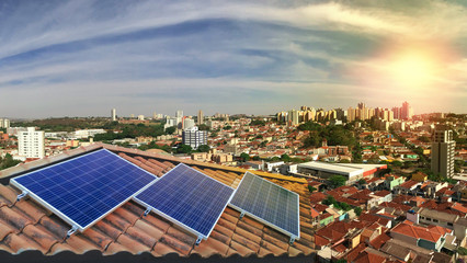 Photovoltaic power plant on the roof of a residential building on sunny day - Solar Energy concept of sustainable resources