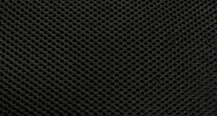 Black nylon fabric pattern texture background.