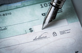 Fototapeta Nowy Jork - writing a check , making payments