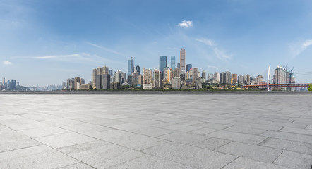 Wall Mural - Panoramic skyline and modern business office buildings with empty road,empty concrete square floor