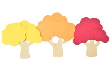 Wall Mural - Autumn trees paper cut on white background - isolated