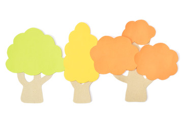Wall Mural - Autumn trees paper cut on white background - isolated