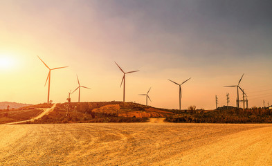 Wall Mural - idea eco power energy. wind turbine on hill with sunset