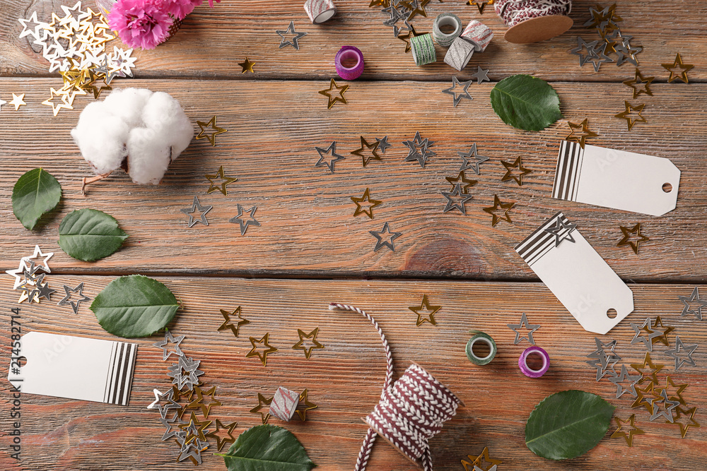 Composition with items for scrapbooking on wooden background
