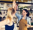 © Rawpixel.com - Women give a high five to each other