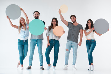 Wall Mural - Group of young people on white background