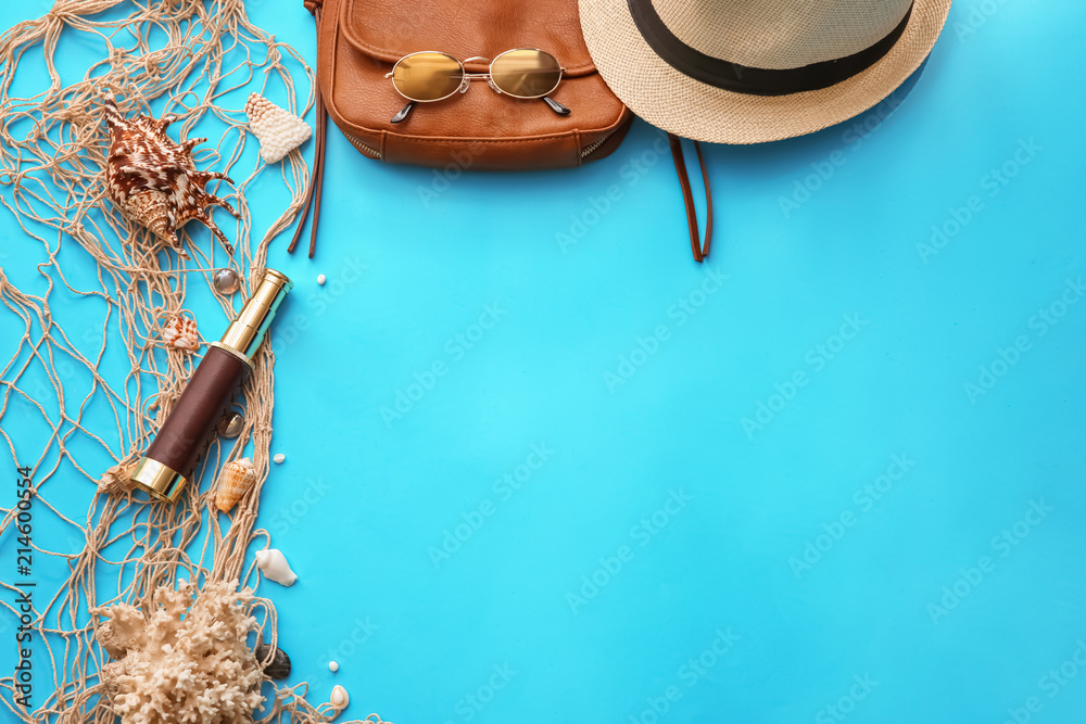 Composition with net, spyglass and stylish accessories on color background
