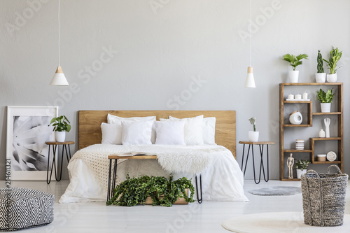 Patterned Pouf And Basket In Bright Bedroom Interior With Lamps Patterned Pouf And Basket In Bright Bedroom Interior With Lamps Plants Poster Next To