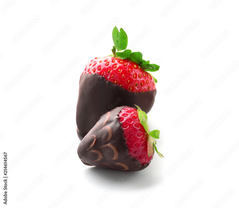 Delicious strawberries covered with chocolate on white background