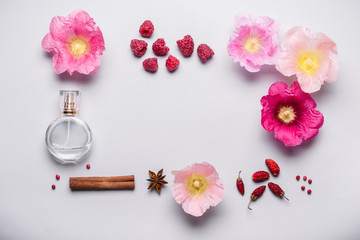 Wall Mural - Bottle of perfume and fragrance ingredients frame