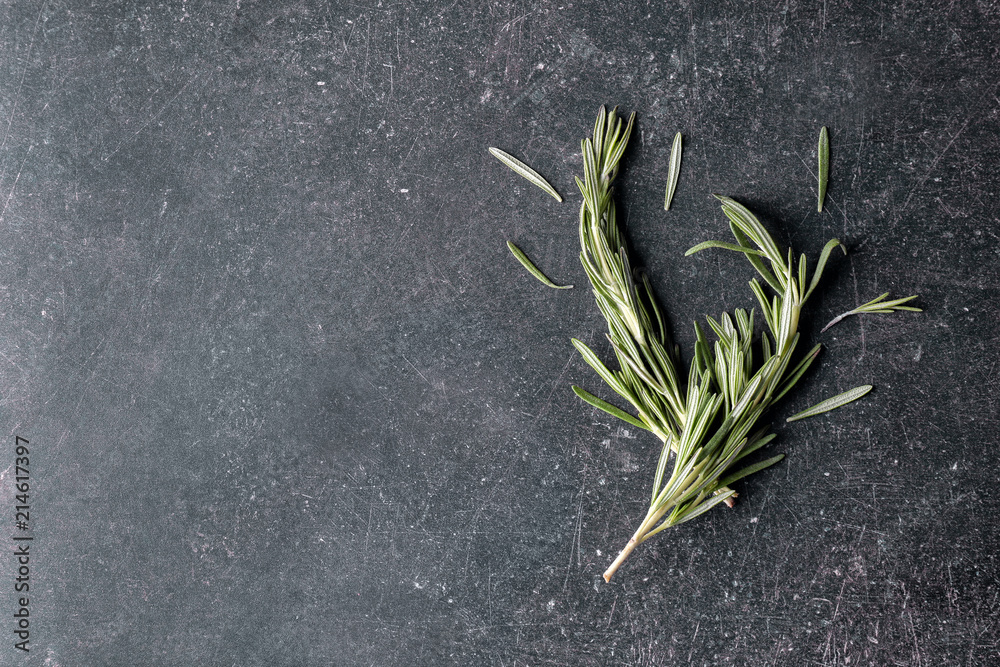 Fresh rosemary on grunge background