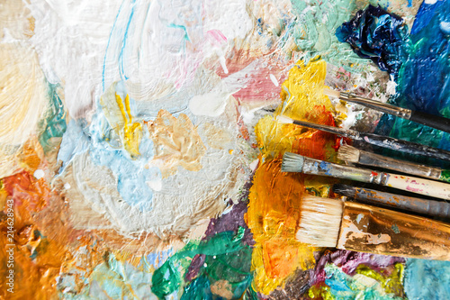 Fotomural Oil paint and paint brush on a palette, abstract art texture, colorful, modern a