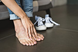 Fototapeta Koty - athlete's foot of woman