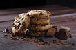 Chocolate cookies on table. Chocolate chip cookies shot with chocolate