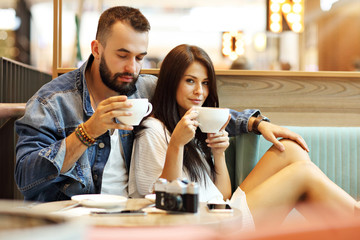 Wall Mural - Romantic couple dating in cafe