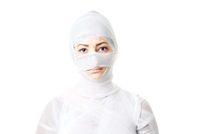 Female Cosmetic Surgery Patient Wrapped In Bandages Looking Like A Mummy