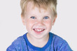 © uv_group - Three years old kid and emotions, close-up portrait of happy smiling child looking at camera at white background