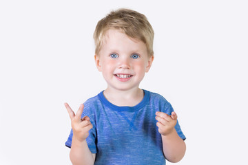 Portrait of cheerful kid boy showing how old he on fingers - isolated over white background