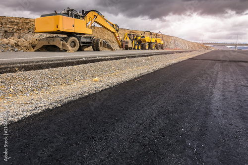 Fotografía Repair of a road after a storm. By heavy machinery