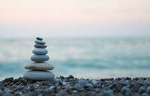Made Of Stone Tower On The Beach And Blur Background