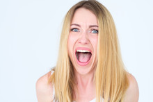 Emotion Face. Scared Fearful Frightened Terrified Distraught Woman Screaming. Young Beautiful Blond Girl Portrait On White Background.