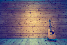 Acoustic Guitar On Wooden Wall, Music Studio Concept Background