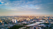 Aerial drone panoramic view of Chelyabinsk city and embankment of Miass river, smoking pipes on the background and blurred horizon, city with bad ecological situation, Russia