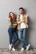 © Drobot Dean - Full length portrait of a cheerful young couple