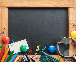 Wall Mural - Blackboard and different school things. Close up.