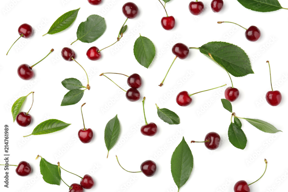 Ripe cherries with leaves on white background
