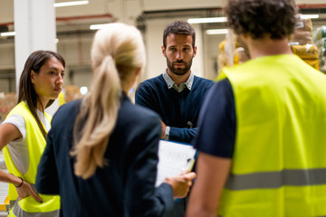 Wall Mural - Warehouse staff meeting