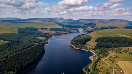 Wall Mural - Aerial drone view of a beautiful reservoir in a rural area in summer