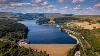 Wall Mural - Aerial drone view of a beautiful reservoir in a rural area in summer