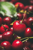 Fresh sweet cherry texture, wallpaper and background. Wet sweet cherries, selective focus, close-up. Summer food or local market produce concept